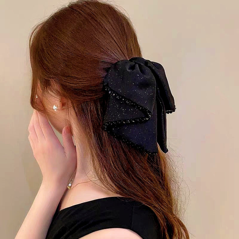 Elegant Starlight Streamer Bow Hair Band