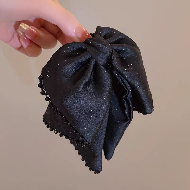 Elegant Starlight Streamer Bow Hair Band
