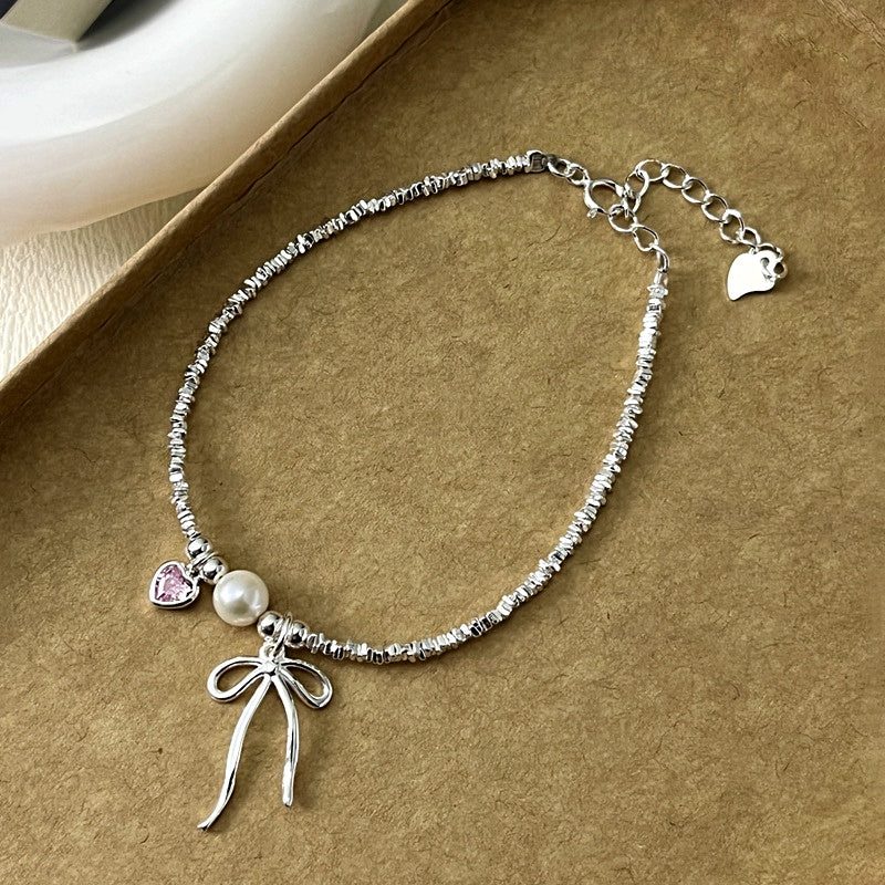 Sterling Silver Bow And Pink Heart Bracelets