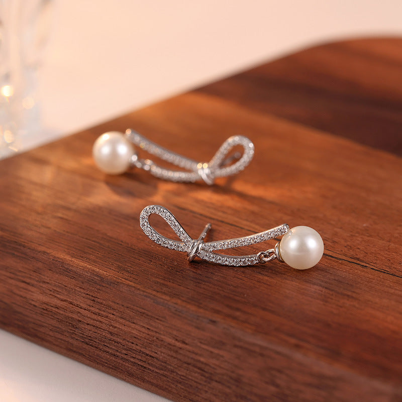 Sterling Silver Bow Pearl Earrings