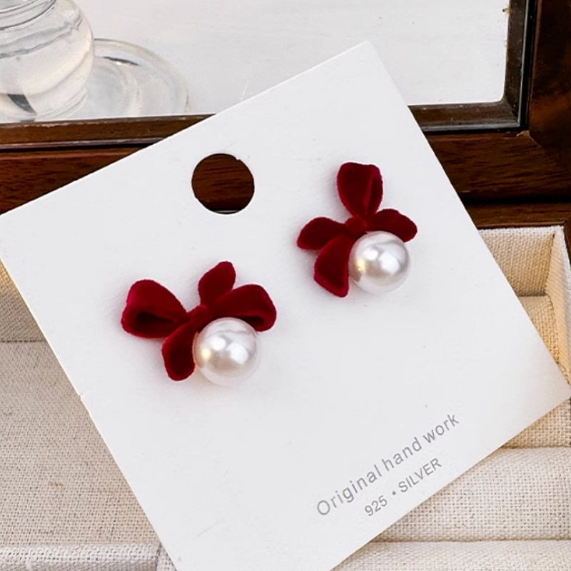 Sterling Silver Bow Pearl Earrings