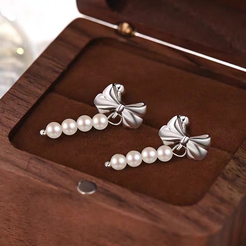 Sterling Silver Elegant Bow And Pearl Earrings