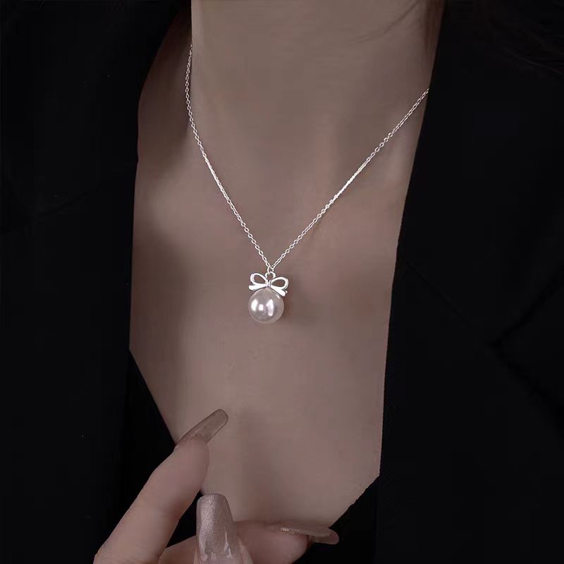 Sterling Silver Elegant Pearl Bow Necklaces