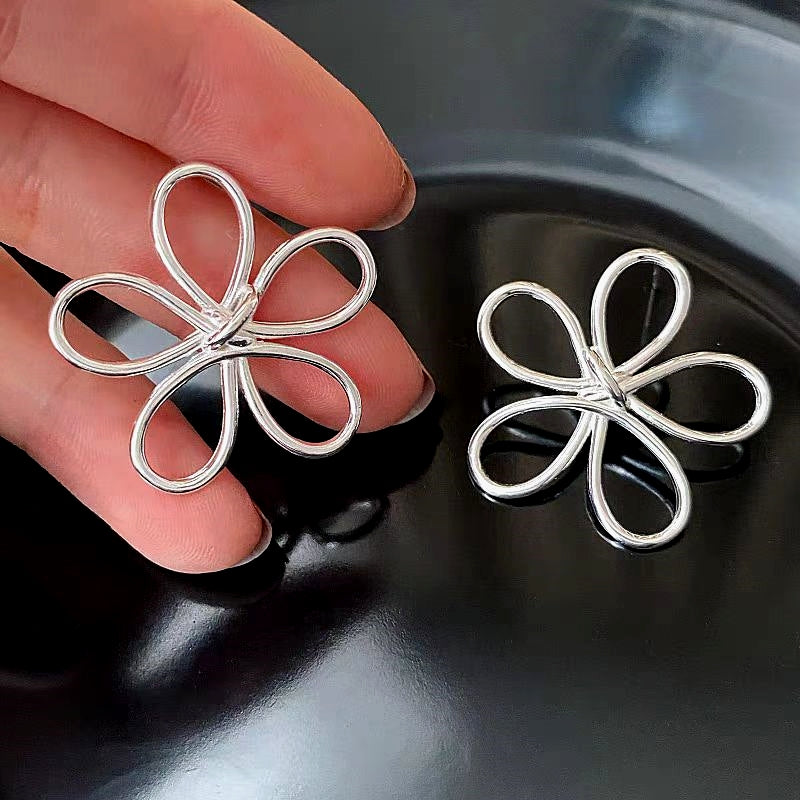 Sterling Silver Hollow Flower Knot Earrings