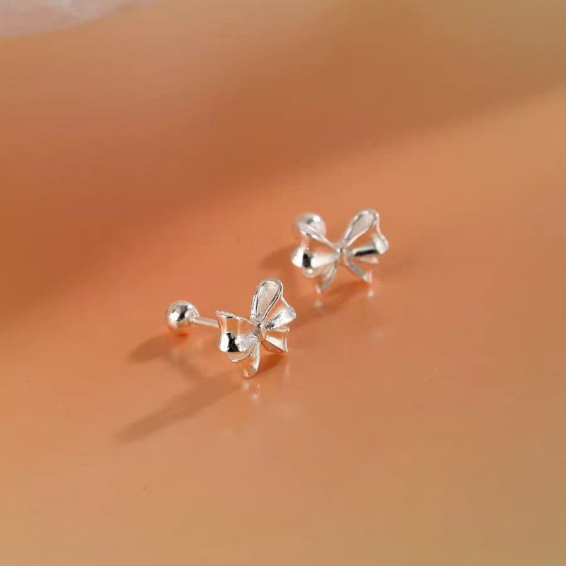 Sterling Silver Niche Design Bow Stud Earrings