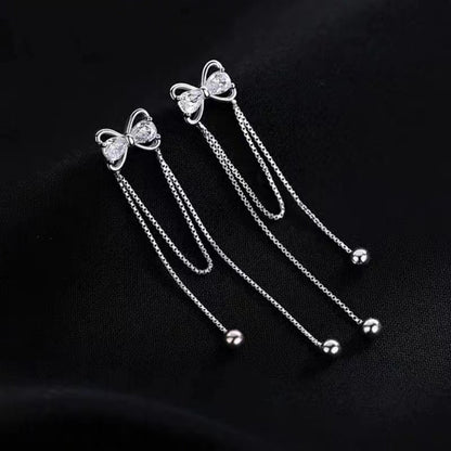 Silver Post Bow Tassel Earrings