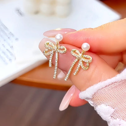 Silver Post Micro-Inlaid Pearl Bow Earrings