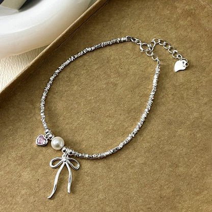 Sterling Silver Bow And Pink Heart Bracelets
