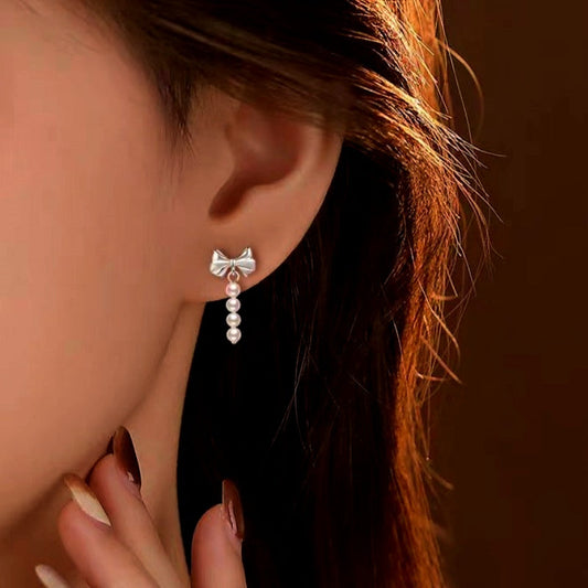 Sterling Silver Elegant Bow And Pearl Earrings