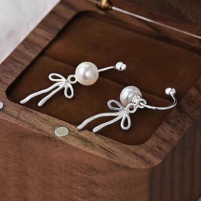 Sterling Silver Elegant Bow Pearl Earrings