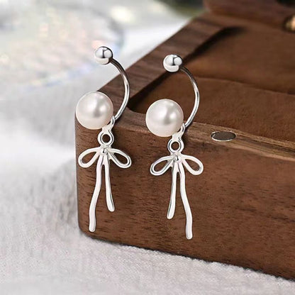 Sterling Silver Elegant Bow Pearl Earrings