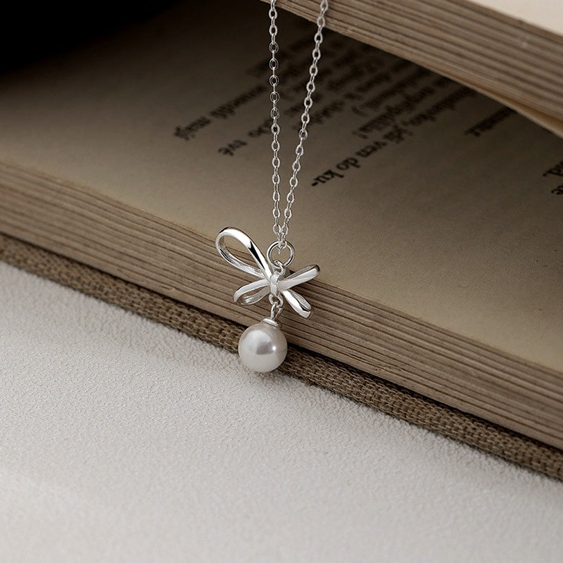 Sterling Silver Elegant Bow Pearl Necklace