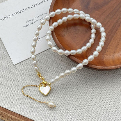 Sterling Silver Heart-Design Natural Pearl Earrings