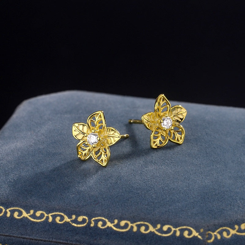 Sterling Silver Hollow Flower Stud Earrings