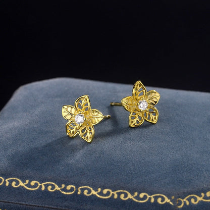 Sterling Silver Hollow Flower Stud Earrings