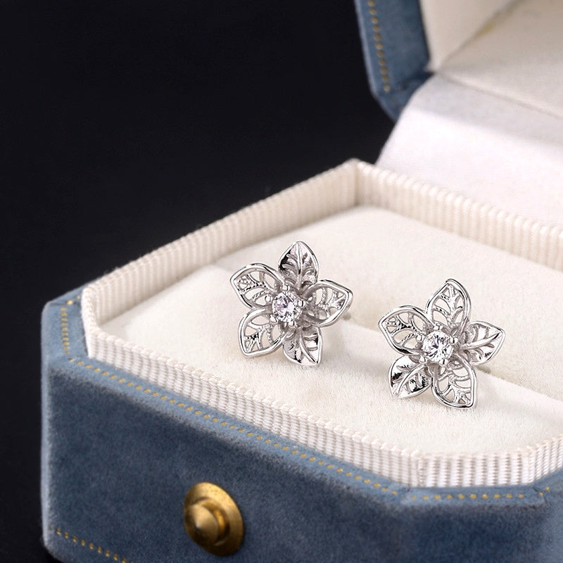 Sterling Silver Hollow Flower Stud Earrings