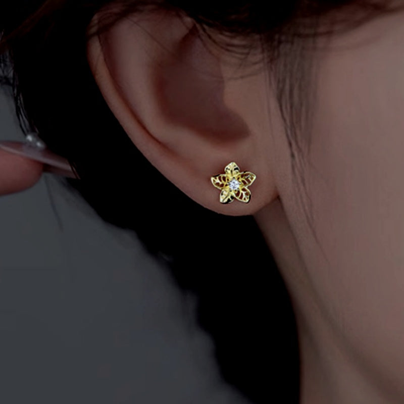 Sterling Silver Hollow Flower Stud Earrings