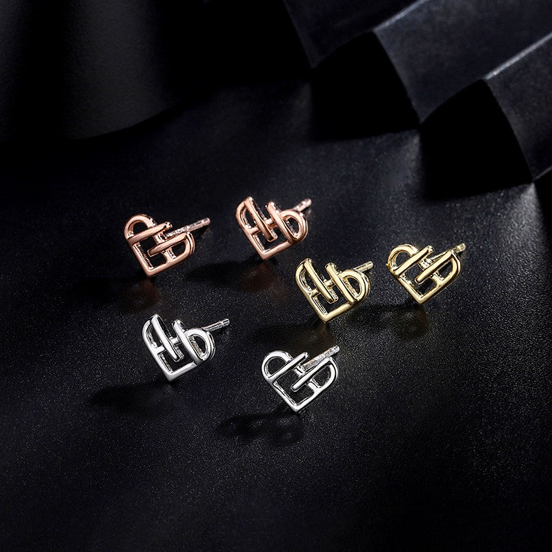 Sterling Silver Hollow Heart Stud Earrings