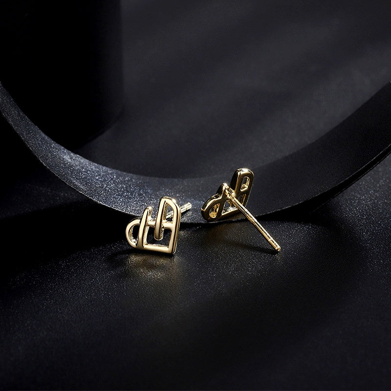 Sterling Silver Hollow Heart Stud Earrings
