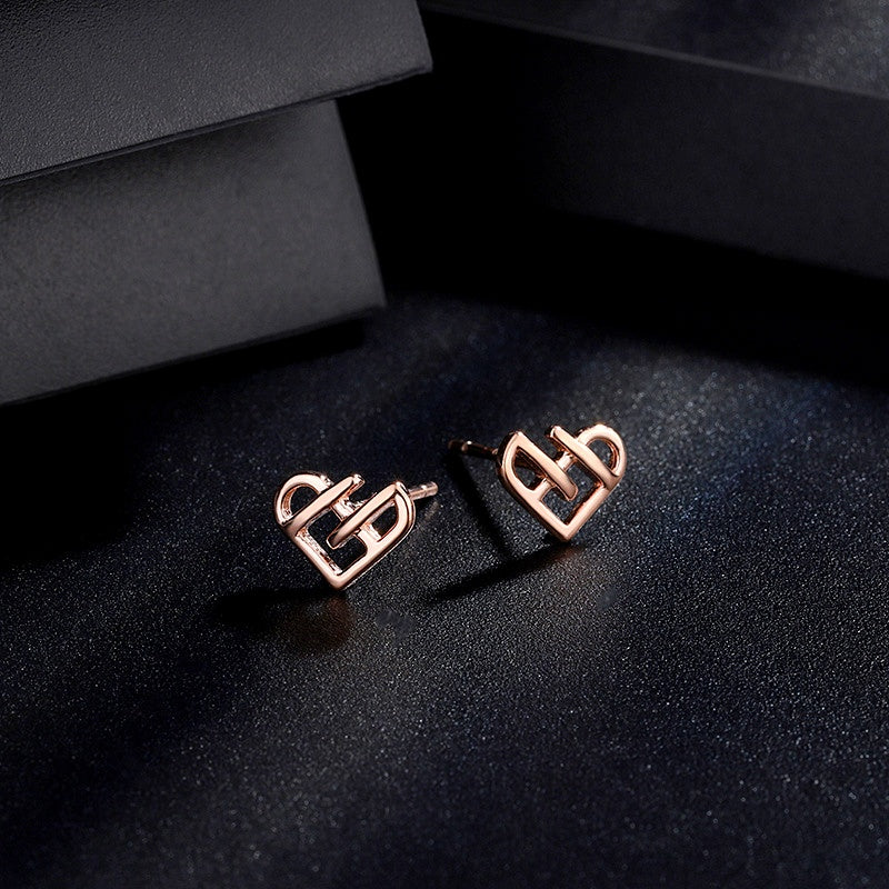 Sterling Silver Hollow Heart Stud Earrings