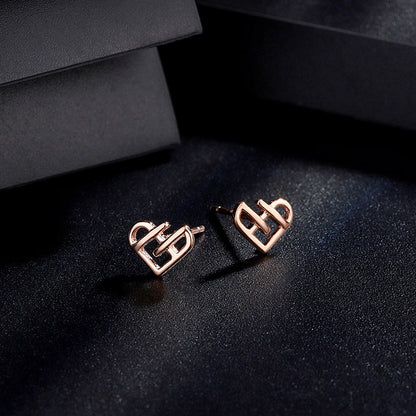 Sterling Silver Hollow Heart Stud Earrings