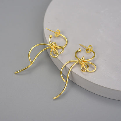 Sterling Silver Vintage Pop Bow Earrings